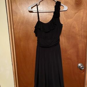 Black dress with flowers on left shoulder